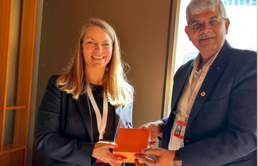 Dr. Anant Pandhare, Vice Chairman, IRCS presenting momento to Ms. Katie Kallio, Chief of Staff